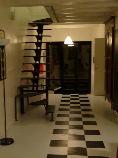 L'escalier qui permet d'accéder à la partie en duplex